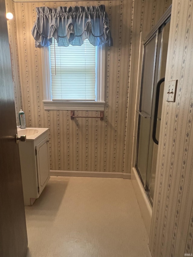 388 Schuetter Rd, Jasper, IN 47546 - full bathroom with an enclosed shower, vanity, and wallpapered walls