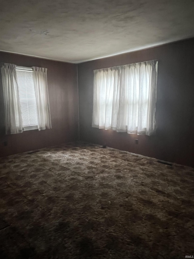 388 Schuetter Rd, Jasper, IN 47546 - spare room featuring dark colored carpet