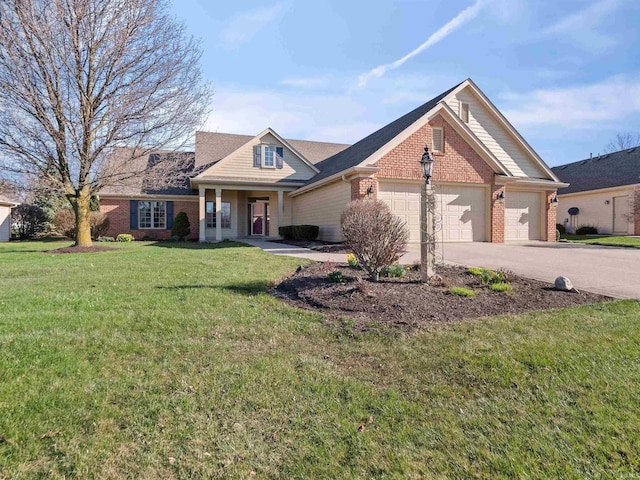 1908 Bent Tree Ct, Auburn, IN 46706 - view of front of home featuring a front lawn, driveway, brick siding, and an attached garage