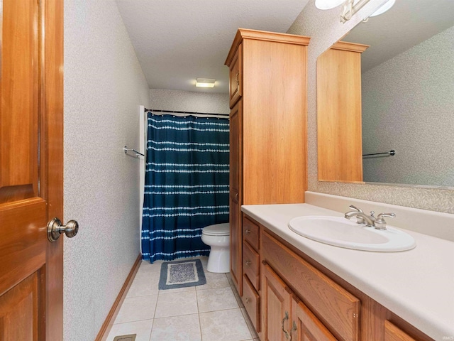 1908 Bent Tree Ct, Auburn, IN 46706 - bathroom featuring toilet, a shower with curtain, vanity, tile patterned flooring, and baseboards