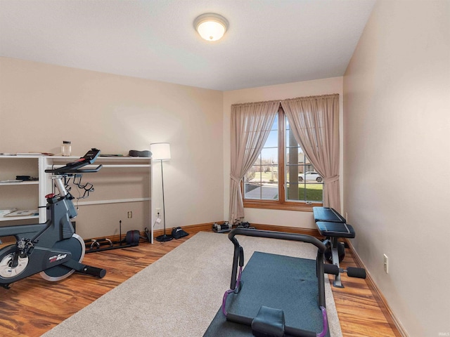 1908 Bent Tree Ct, Auburn, IN 46706 - workout area with baseboards and wood finished floors