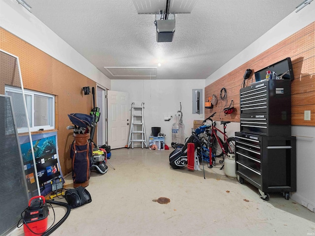 1908 Bent Tree Ct, Auburn, IN 46706 - garage with electric panel and a garage door opener