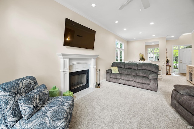1611 Rockwood Ln, Mishawaka, IN 46545 - living area with light colored carpet, a ceiling fan, ornamental molding, and recessed lighting