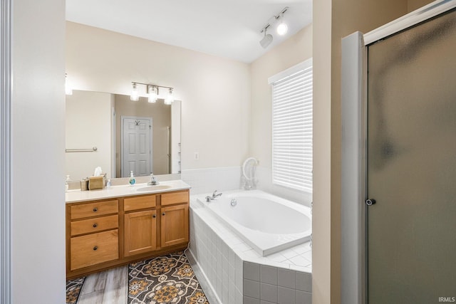 1611 Rockwood Ln, Mishawaka, IN 46545 - full bathroom featuring a stall shower, vanity, and a bath