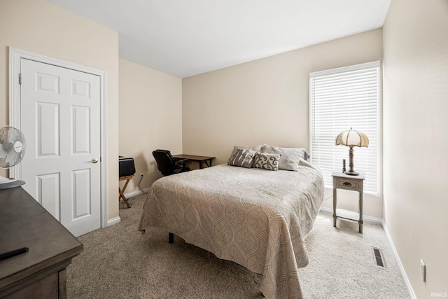 1611 Rockwood Ln, Mishawaka, IN 46545 - bedroom with light carpet, baseboards, and visible vents