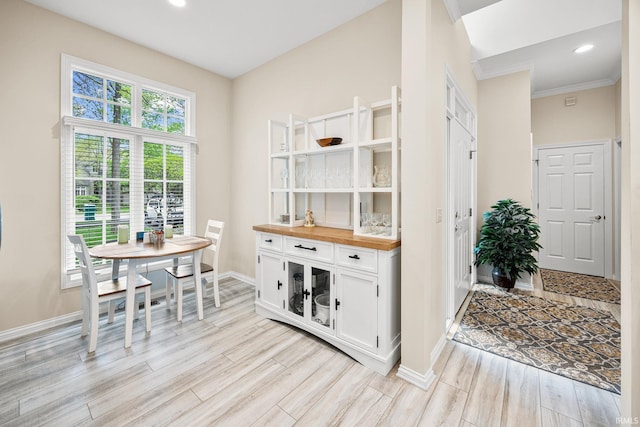 1611 Rockwood Ln, Mishawaka, IN 46545 - interior space featuring baseboards, recessed lighting, light wood-style floors, and ornamental molding