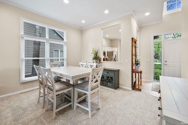 1611 Rockwood Ln, Mishawaka, IN 46545 - dining space with light colored carpet, ornamental molding, baseboards, and recessed lighting