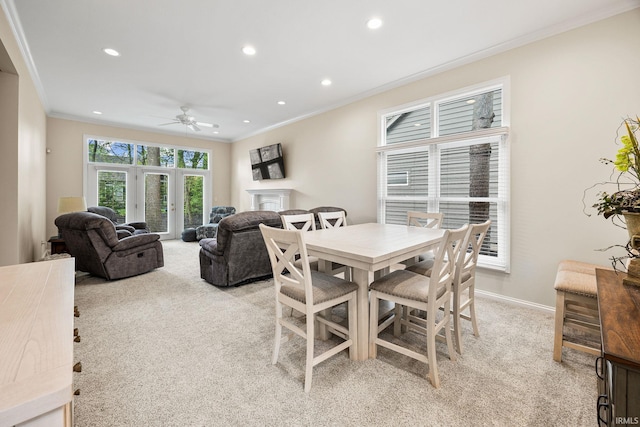 1611 Rockwood Ln, Mishawaka, IN 46545 - dining room featuring a ceiling fan, recessed lighting, baseboards, ornamental molding, and light colored carpet
