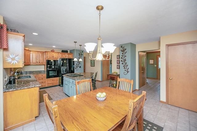 dining space featuring light tile patterned floors, baseboards, a chandelier, and recessed lighting