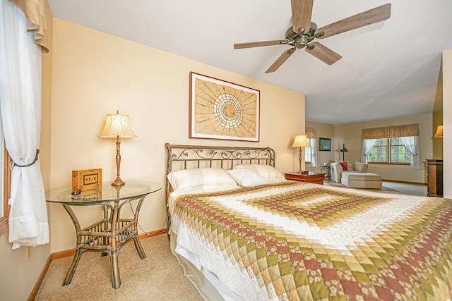bedroom with carpet floors and baseboards