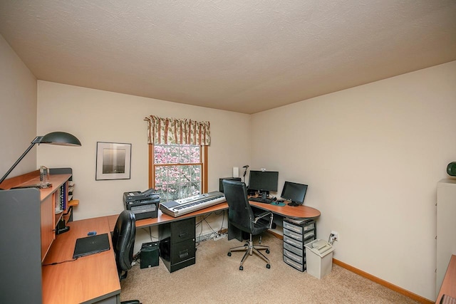 carpeted office with baseboards