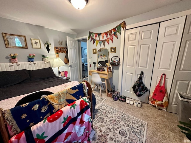 bedroom with a closet and carpet floors