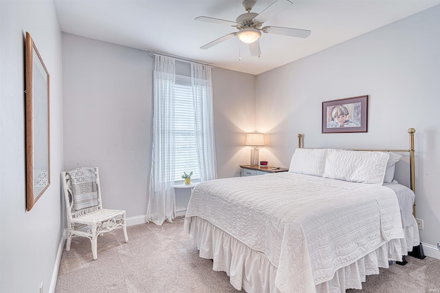 bedroom with carpet, baseboards, and ceiling fan