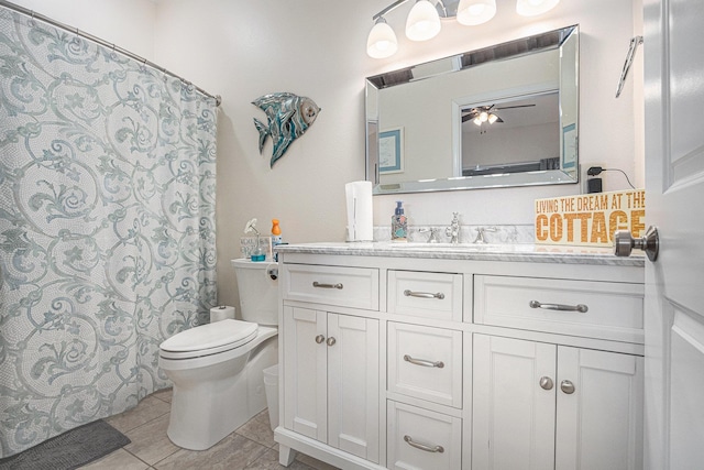 full bathroom featuring toilet, a shower with curtain, vanity, and tile patterned flooring