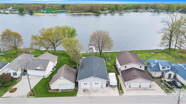aerial view with a water view and a residential view
