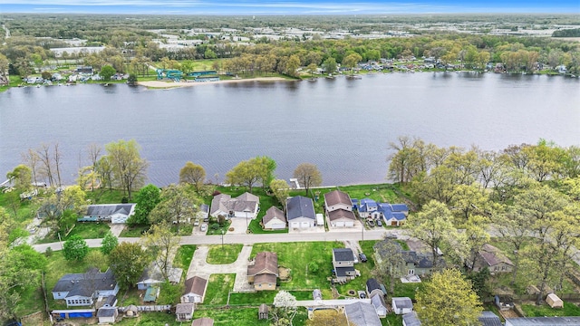 bird's eye view with a water view and a residential view