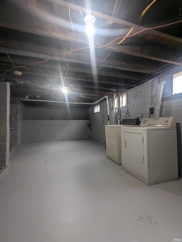 basement featuring separate washer and dryer