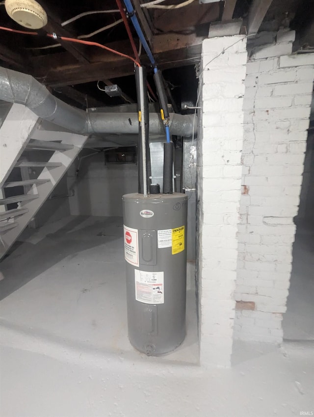 utility room with electric water heater