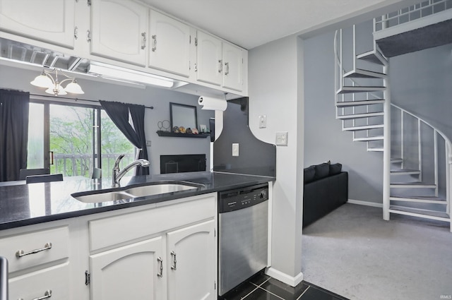 9404 S Lake Ridge Dr, Bloomington, IN 47401 - kitchen with a sink, white cabinets, stainless steel dishwasher, baseboards, and dark countertops