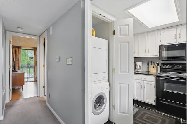 9404 S Lake Ridge Dr, Bloomington, IN 47401 - washroom featuring baseboards, laundry area, and stacked washer / drying machine