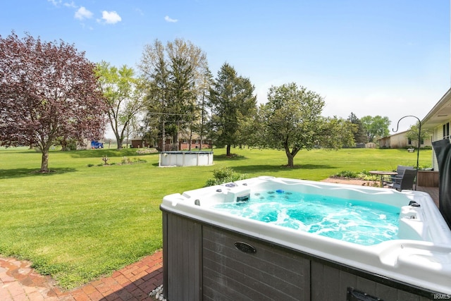 view of yard featuring a hot tub