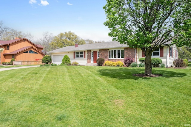 ranch-style house featuring a front lawn, a chimney, brick siding, and a garage