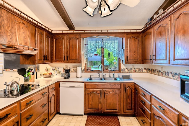 kitchen featuring a sink, black electric stovetop, ceiling fan, light countertops, and white dishwasher