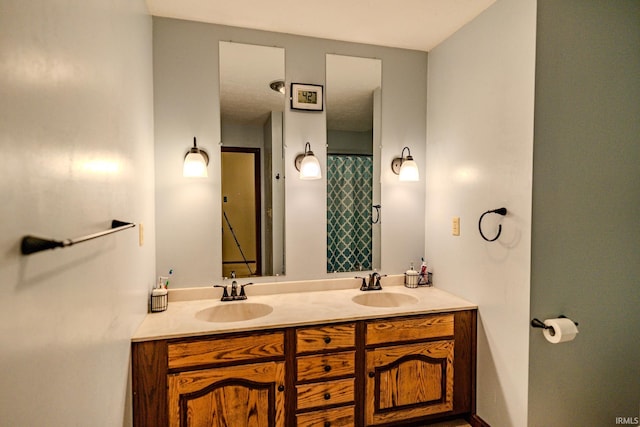 bathroom with double vanity and a sink