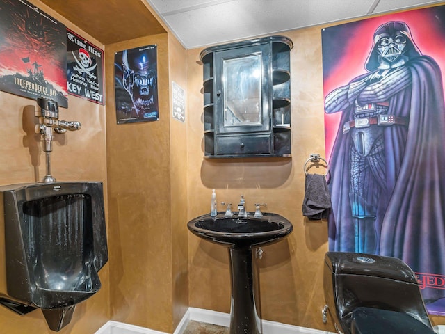 bathroom featuring baseboards