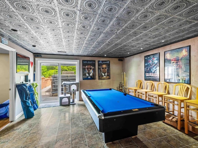 recreation room with billiards and an ornate ceiling