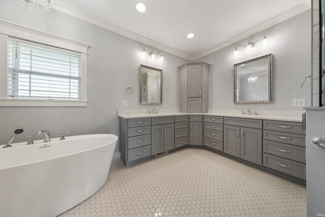11499 W Nobles Chapel Rd, Elberfeld, IN 47613 - bathroom featuring a soaking tub, double vanity, ornamental molding, and a sink