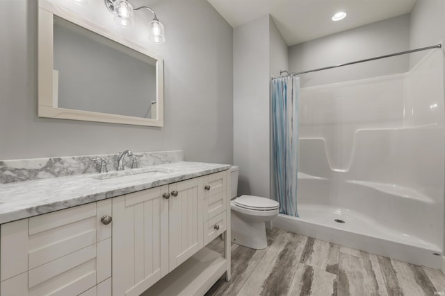 11499 W Nobles Chapel Rd, Elberfeld, IN 47613 - bathroom with a stall shower, recessed lighting, toilet, vanity, and wood finished floors