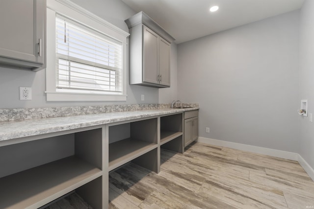 11499 W Nobles Chapel Rd, Elberfeld, IN 47613 - laundry area with cabinet space, light wood-type flooring, baseboards, and recessed lighting
