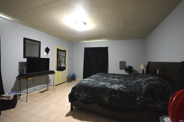bedroom featuring a textured ceiling