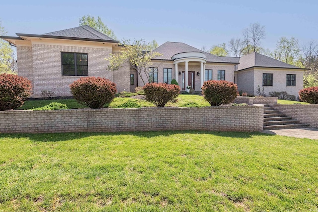 9225 S Foggy Ridge Ln, Bloomington, IN 47401 - single story home featuring stairway, a front lawn, and brick siding