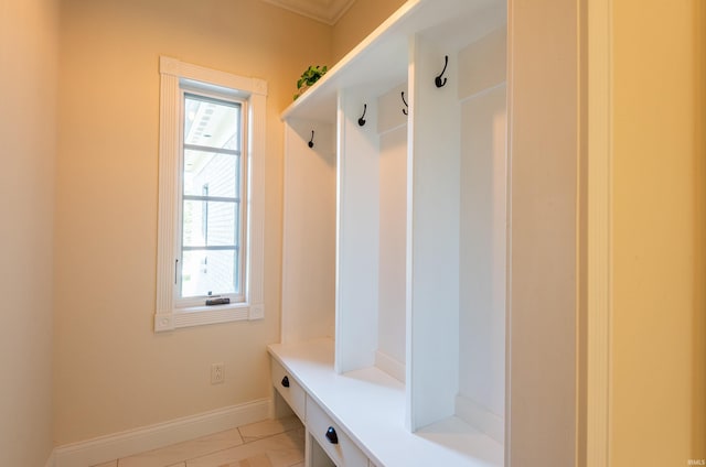 9225 S Foggy Ridge Ln, Bloomington, IN 47401 - mudroom featuring baseboards and ornamental molding