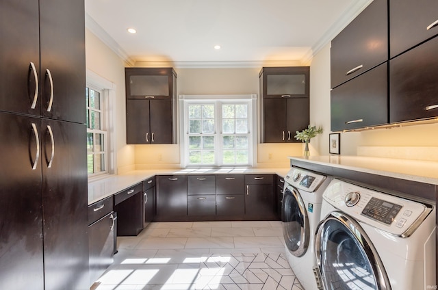 9225 S Foggy Ridge Ln, Bloomington, IN 47401 - clothes washing area with cabinet space, washer and clothes dryer, a healthy amount of sunlight, and ornamental molding