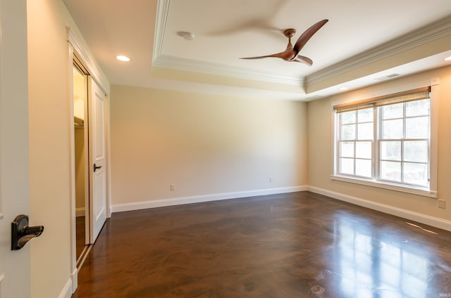 9225 S Foggy Ridge Ln, Bloomington, IN 47401 - unfurnished room with visible vents, a raised ceiling, a ceiling fan, and ornamental molding