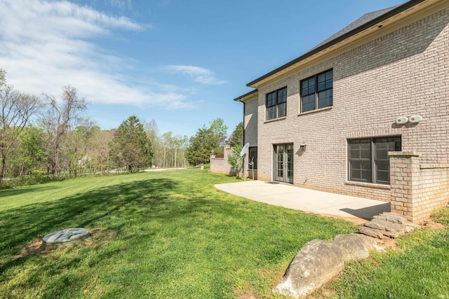9225 S Foggy Ridge Ln, Bloomington, IN 47401 - view of yard featuring a patio area