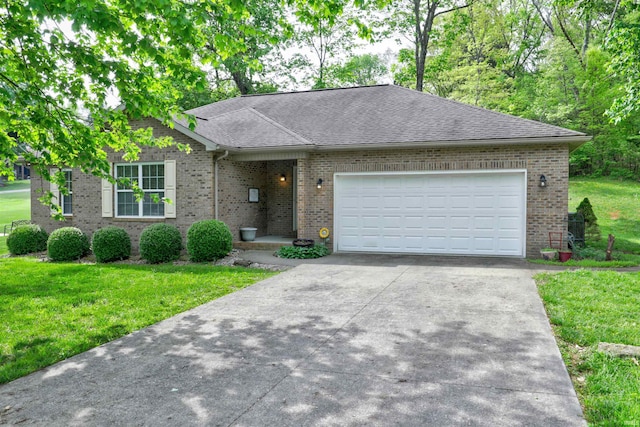 918 S December 25th Ln, Santa Claus, IN 47579 - ranch-style house with driveway, brick siding, a front lawn, and an attached garage