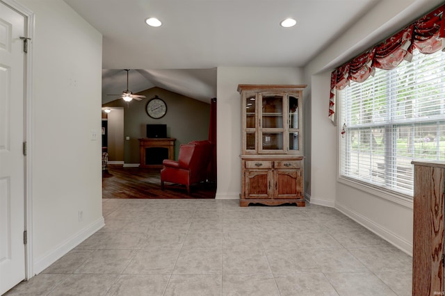 918 S December 25th Ln, Santa Claus, IN 47579 - interior space featuring lofted ceiling, a ceiling fan, light tile patterned floors, and recessed lighting