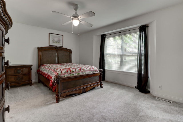 918 S December 25th Ln, Santa Claus, IN 47579 - carpeted bedroom featuring baseboards, visible vents, and a ceiling fan