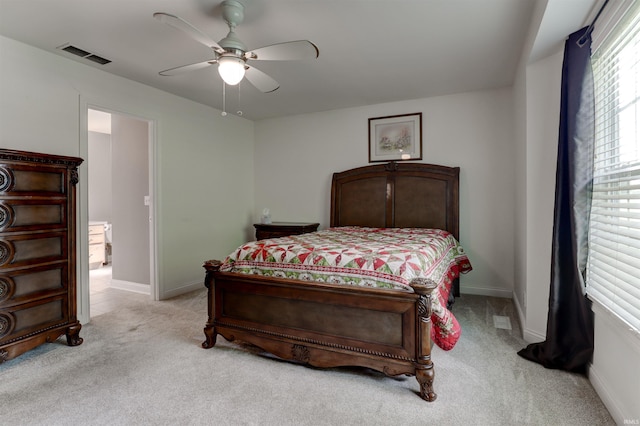 918 S December 25th Ln, Santa Claus, IN 47579 - bedroom featuring light colored carpet, baseboards, ceiling fan, and visible vents