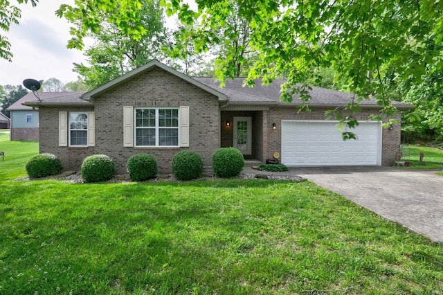 918 S December 25th Ln, Santa Claus, IN 47579 - ranch-style house featuring concrete driveway, a front lawn, brick siding, and an attached garage
