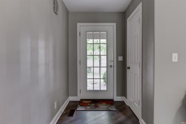 918 S December 25th Ln, Santa Claus, IN 47579 - entryway featuring baseboards, visible vents, and dark wood-type flooring