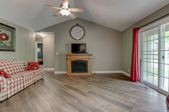 918 S December 25th Ln, Santa Claus, IN 47579 - living area with wood finished floors, visible vents, baseboards, ceiling fan, and lofted ceiling
