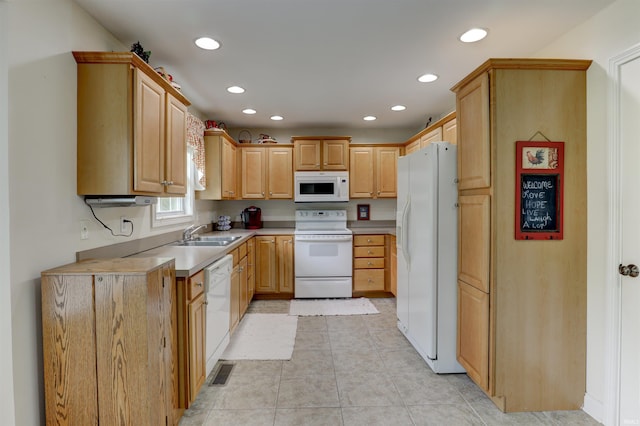 918 S December 25th Ln, Santa Claus, IN 47579 - kitchen with a sink, white appliances, visible vents, recessed lighting, and light countertops