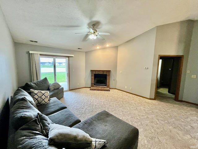 living room featuring light colored carpet, visible vents, a fireplace, a ceiling fan, and baseboards