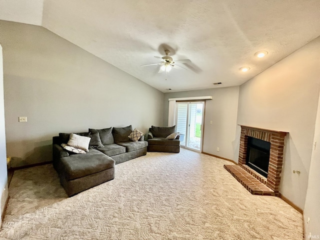 living area featuring a brick fireplace, carpet, baseboards, and a ceiling fan