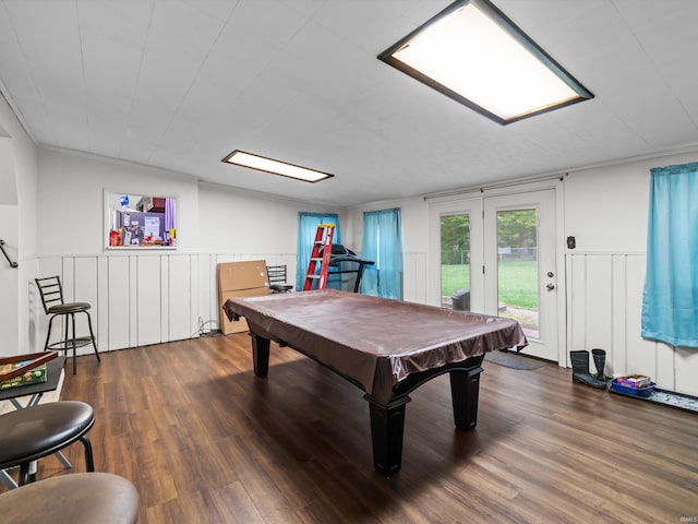 playroom featuring billiards, wainscoting, a decorative wall, and wood finished floors